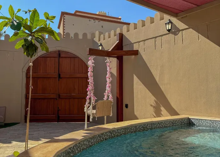 بيت أرض الثراء Rich Land House